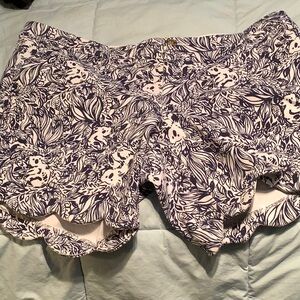 Lilly Pulitzer navy printed scalloped knit shorts.